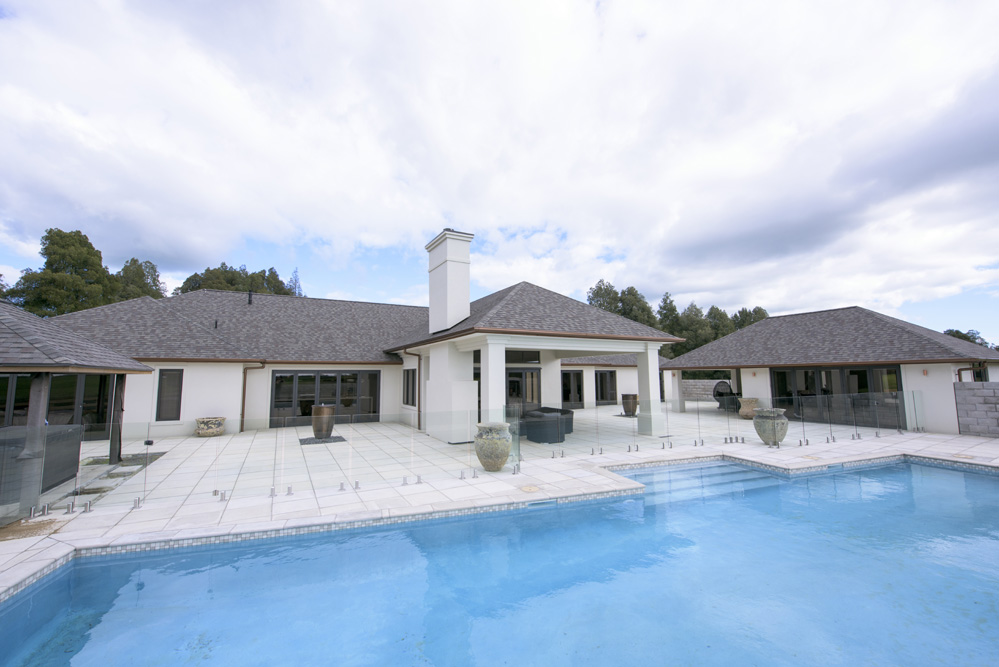Te Awamutu new build home inground pool with glass balustrades